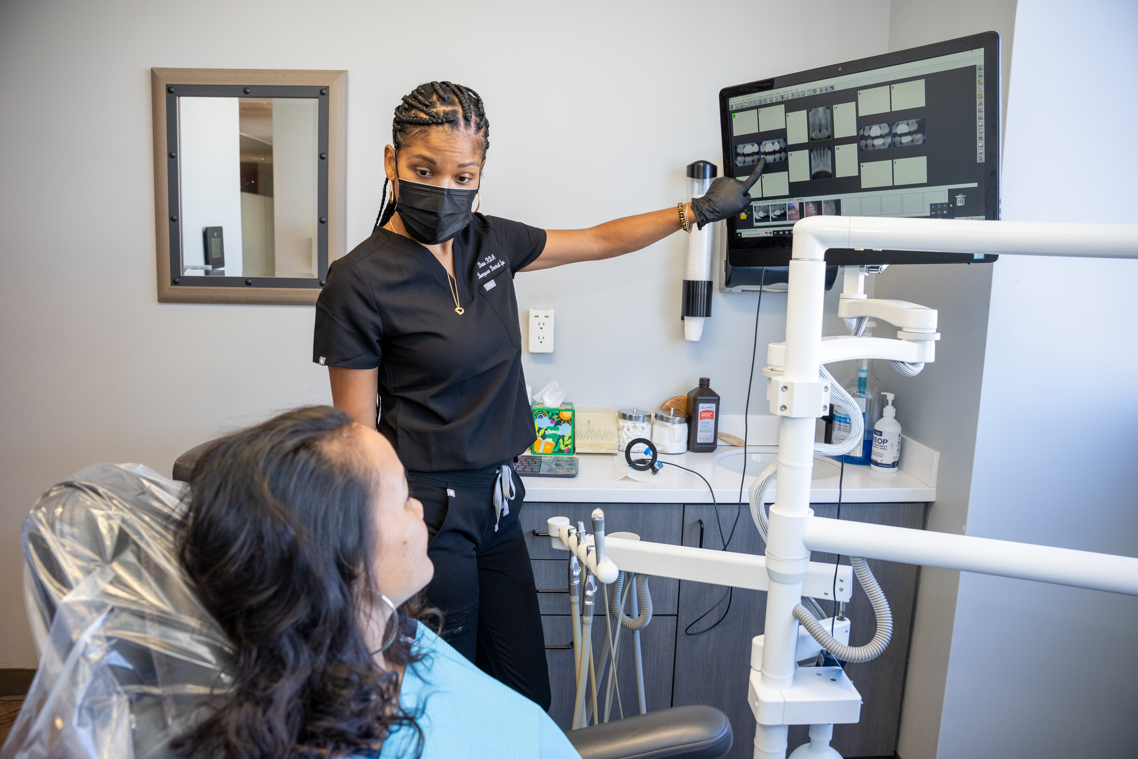 Dentist showing results in clinic - Veneers In Los Angeles, CA Dentist showing results in clinic - Veneers In Los Angeles, CA