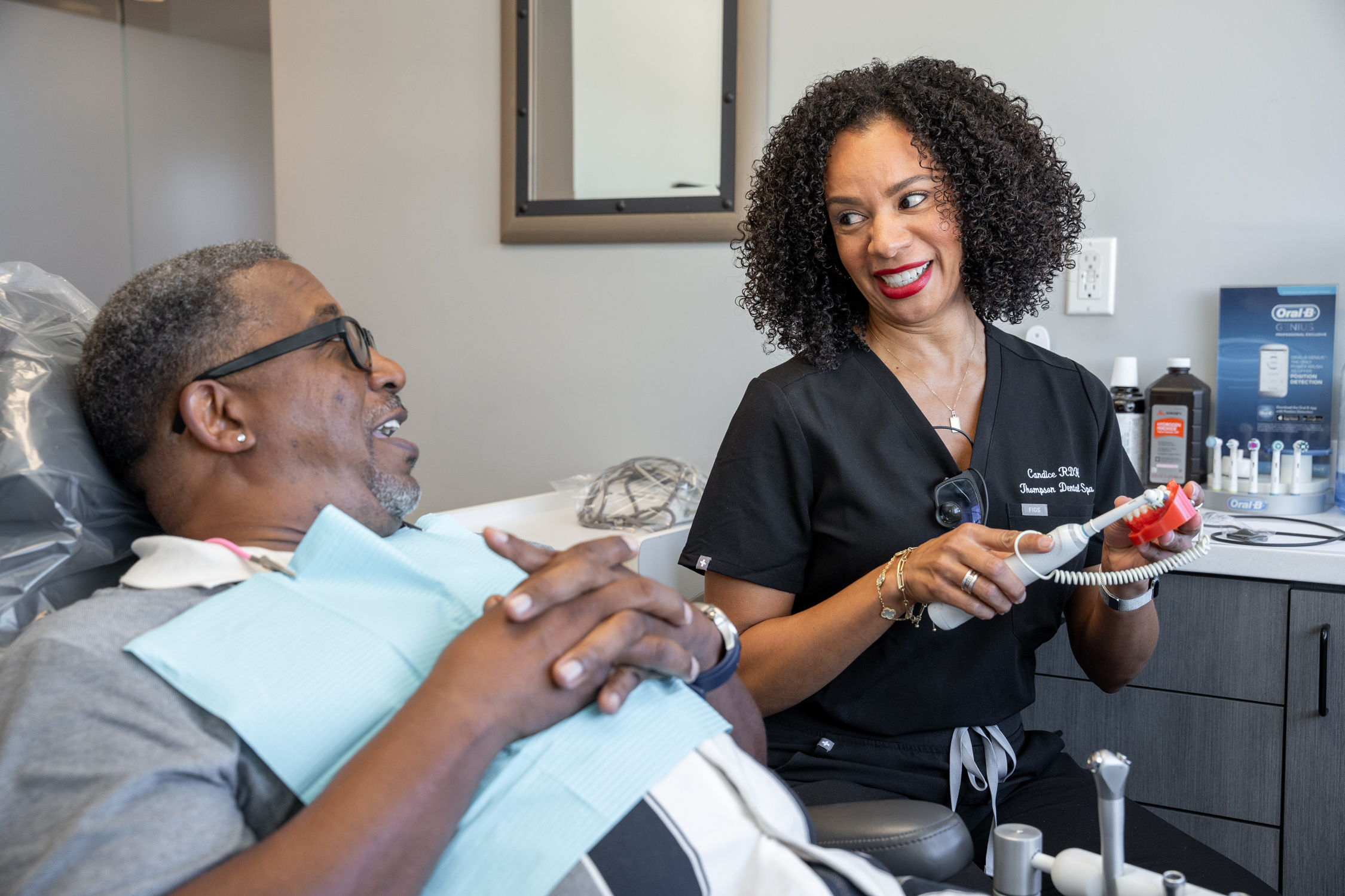 Dr. Thompson explaining to a patient - Teeth Whitening In Los Angeles, CA
